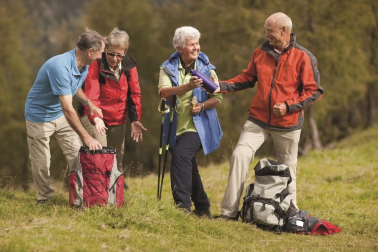 four senior hikers enjoying their day